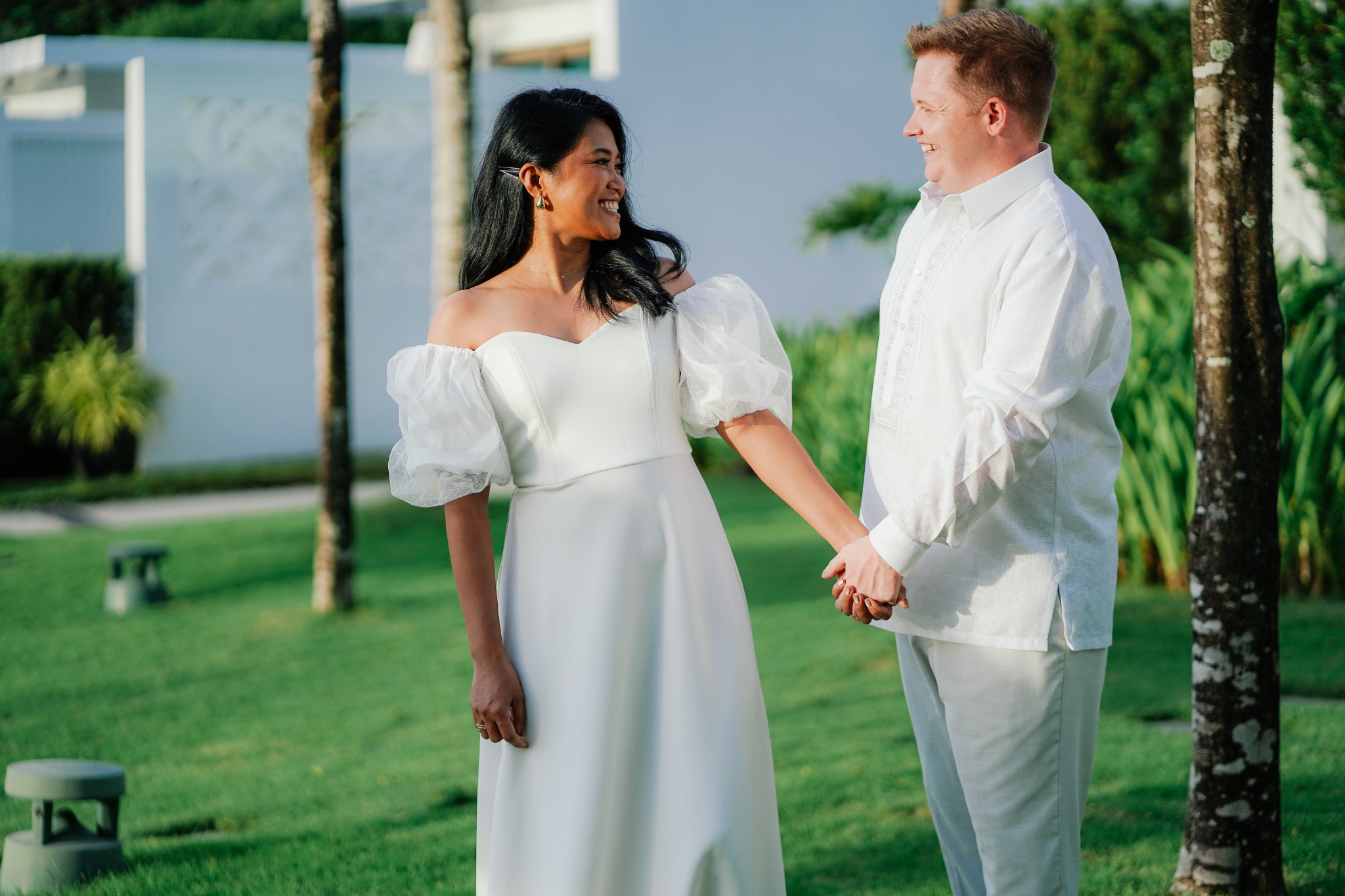 Jenny and Elliot walking through the resort